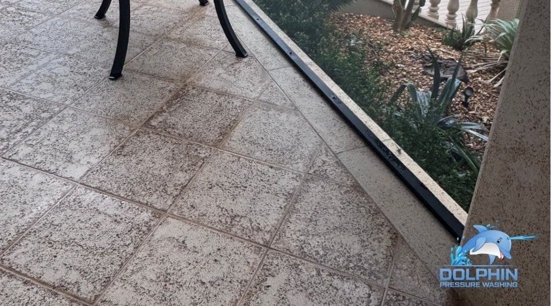 Before and after of a paver patio with the green algae removed, after