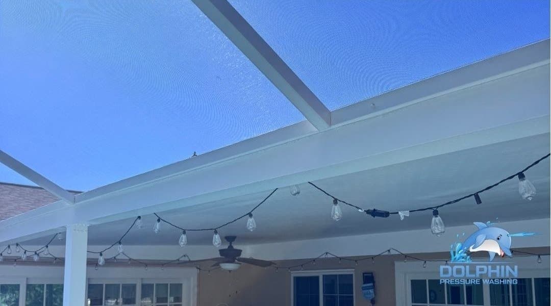 Before and after of a lanai screen roof cleaned in Naples, after